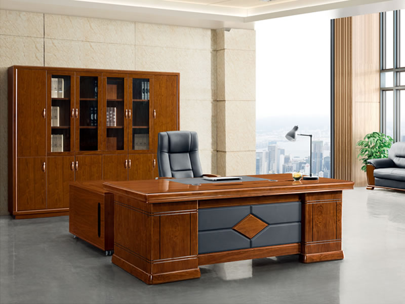 Elevate your executive workspace with our 1800mm Executive Office Desk – a fusion of functionality and sophistication designed to meet the exacting standards of the modern professional. With a width of 1800mm, this executive desk offers a spacious and stylish solution for executive offices and managerial spaces. Crafted with meticulous precision and a dedication to quality, our Executive Office Desk emanates contemporary elegance that transforms any workspace into a realm of executive luxury. The generous 1800mm width ensures an expansive surface, accommodating computers, paperwork, and other essentials with ease, creating a workspace that seamlessly marries practicality with executive opulence. Constructed from premium materials, this executive desk guarantees durability and endurance. The sleek design, complemented by fine finishes, adds a touch of refinement to your office decor, establishing an environment that mirrors your unwavering commitment to excellence. Functionality takes center stage with the 1800mm Executive Office Desk. Thoughtfully designed, this desk features integrated storage solutions and cable management options, providing convenience and organization. Say goodbye to clutter, allowing you to focus on your tasks in an environment that promotes efficiency and productivity. Durability meets executive grandeur with our Executive Office Desk. The robust construction ensures a reliable and enduring workspace, capable of withstanding the demands of a high-paced executive environment. Versatile and adaptable, this executive desk seamlessly integrates into various office aesthetics. Whether your office leans towards a classic, traditional look or embraces a more modern design, the 1800mm Executive Office Desk stands as a timeless piece that complements different styles with unmatched allure. Elevate your executive workspace with the 1800mm Executive Office Desk – where form meets function seamlessly. This desk is not just furniture; it's a statement of your commitment to creating an executive workspace that reflects your professional stature. Choose excellence, choose sophistication – choose the 1800mm Executive Office Desk for an executive environment that exudes unparalleled style and functionality.