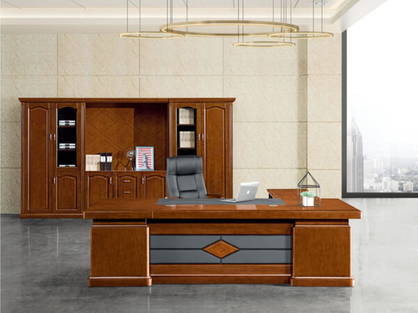 Elevate your executive workspace with our 1800mm Executive Office Desk – a fusion of functionality and sophistication designed to meet the exacting standards of the modern professional. With a width of 1800mm, this executive desk offers a spacious and stylish solution for executive offices and managerial spaces. Crafted with meticulous precision and a dedication to quality, our Executive Office Desk emanates contemporary elegance that transforms any workspace into a realm of executive luxury. The generous 1800mm width ensures an expansive surface, accommodating computers, paperwork, and other essentials with ease, creating a workspace that seamlessly marries practicality with executive opulence. Constructed from premium materials, this executive desk guarantees durability and endurance. The sleek design, complemented by fine finishes, adds a touch of refinement to your office decor, establishing an environment that mirrors your unwavering commitment to excellence. Functionality takes center stage with the 1800mm Executive Office Desk. Thoughtfully designed, this desk features integrated storage solutions and cable management options, providing convenience and organization. Say goodbye to clutter, allowing you to focus on your tasks in an environment that promotes efficiency and productivity. Durability meets executive grandeur with our Executive Office Desk. The robust construction ensures a reliable and enduring workspace, capable of withstanding the demands of a high-paced executive environment. Versatile and adaptable, this executive desk seamlessly integrates into various office aesthetics. Whether your office leans towards a classic, traditional look or embraces a more modern design, the 1800mm Executive Office Desk stands as a timeless piece that complements different styles with unmatched allure. Elevate your executive workspace with the 1800mm Executive Office Desk – where form meets function seamlessly. This desk is not just furniture; it's a statement of your commitment to creating an executive workspace that reflects your professional stature. Choose excellence, choose sophistication – choose the 1800mm Executive Office Desk for an executive environment that exudes unparalleled style and functionality.