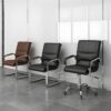 Task Chair Leather Office Chair, office furniture, task chair, leather chair, ergonomic chair, comfortable seating, supportive chair, office seating, executive chair, office essentials, office equipment, leather office chair, executive leather chair, modern design chair, ergonomic leather chair, adjustable chair, swivel chair, lumbar support chair, breathable chair, ergonomic task chair, executive task chair, durable leather chair, commercial-grade chair, leather office furniture, executive office seating, office chair with leather upholstery.