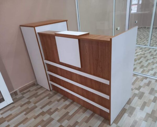 reception desk, modern reception desk, office reception desk, front office desk, reception counter, reception table, salon reception desk, hotel reception desk, business reception desk, contemporary reception desk, L-shaped reception desk, U-shaped reception desk, wooden reception desk, glass reception desk, custom reception desk, compact reception desk, stylish reception desk, small reception desk, large reception desk, curved reception desk, luxury reception desk, modular reception desk, affordable reception desk, reception desk with drawers, reception desk with shelves, reception desk with storage, minimalist reception desk, premium reception desk, reception area furniture, reception workstation, executive reception desk, reception desk Kenya, reception desk Nairobi, office reception counter, reception furniture set, front desk, receptionist table, office front desk furniture, modern lobby desk, reception desk design, elegant reception desk, reception desk with lighting, curved front desk, reception counter with signage, high-end reception desk, custom-built reception desk, front office furniture, salon front desk, front counter, sleek reception desk, minimalist front desk, front desk for office, welcome desk, boutique reception desk, compact lobby desk, office entrance desk, front office workstation, modular front counter, modern entry desk, executive lobby desk, office receiving counter, reception desk with branding panel, hotel front desk, dental reception desk, medical reception desk, front counter furniture, classic reception desk, durable reception desk, high gloss reception desk, matte finish reception desk, front desk with LED lights, acrylic reception desk, metal reception desk, ergonomic reception desk, compact welcome desk, professional reception desk, multi-level reception desk, front office reception unit, open front reception desk, front desk with privacy screen, two-tone reception desk, reception area counter, visitor greeting desk, clinic reception desk, bank reception desk, customized reception counter, reception bar counter, office welcome counter, modern business desk, curved reception counter, school reception desk, institution front desk, portable reception desk, reception desk with wheels, reception counter with cabinet, high reception counter, corporate reception desk, reception desk for entrance, showroom reception desk, retail front desk, aesthetic reception desk, reception kiosk, entry point reception counter, dual-level reception desk, office check-in counter, reception corner desk, front office check-in table, small office front desk, waiting area reception desk, reception counter with display shelf, reception furniture solutions, branded reception desk, luxury front office desk, home office reception desk, minimalist lobby desk, front office design table, interior reception furniture, front desk with drawers and shelves, welcome area desk, reception bench with desk, reception podium, reception desk package, office entry desk, multifunction reception table, laminated reception desk, melamine reception desk, woodgrain reception desk, black reception desk, white reception desk, brown reception desk, grey reception desk, executive front desk, professional front office table, business welcome desk, corporate welcome table, office furniture front desk, reception office set, waiting room counter, modern reception counter furniture, reception furniture Kenya, reception tables Nairobi, front desk installation, best reception desks Nairobi, affordable front office desk Kenya, top reception desk suppliers Kenya, modern office entrance desk, reception desk with file storage, salon counter design, stylish entrance desk, decorative reception table, entry desk with signage holder, reception desk with drawers and cabinet, client greeting table, reception setup furniture, office lobby interior furniture, customer care desk, front area counter, client service desk, welcome counter, reception workstation furniture, waiting area desk unit, reception desk for lobby, reception unit with lockable drawers, secure reception counter, reception desk with filing space, workstation reception combo, reception furniture arrangement, entry point desk for business, high-traffic reception desk, workstation style reception table, hospitality front desk, office desk for reception area, open reception counter, panel-based reception desk, low reception counter, double-sided reception desk, open plan reception desk, compact front desk for small offices, reception desk furniture solution, elegant front desk furniture, best reception desk design, multi-purpose reception table, reception console desk, reception area workstation, front desk workspace, ergonomic receptionist desk, retail store reception desk, multifunctional reception furniture, workstation and reception combo, durable front office desk, visitor handling desk, greeting area counter, reception console, office reception design ideas, and reception counter with nameplate.