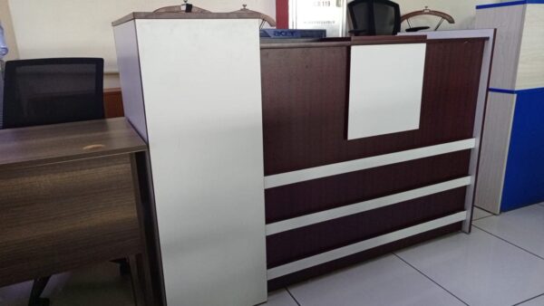 reception desk, modern reception desk, office reception desk, front office desk, reception counter, reception table, salon reception desk, hotel reception desk, business reception desk, contemporary reception desk, L-shaped reception desk, U-shaped reception desk, wooden reception desk, glass reception desk, custom reception desk, compact reception desk, stylish reception desk, small reception desk, large reception desk, curved reception desk, luxury reception desk, modular reception desk, affordable reception desk, reception desk with drawers, reception desk with shelves, reception desk with storage, minimalist reception desk, premium reception desk, reception area furniture, reception workstation, executive reception desk, reception desk Kenya, reception desk Nairobi, office reception counter, reception furniture set, front desk, receptionist table, office front desk furniture, modern lobby desk, reception desk design, elegant reception desk, reception desk with lighting, curved front desk, reception counter with signage, high-end reception desk, custom-built reception desk, front office furniture, salon front desk, front counter, sleek reception desk, minimalist front desk, front desk for office, welcome desk, boutique reception desk, compact lobby desk, office entrance desk, front office workstation, modular front counter, modern entry desk, executive lobby desk, office receiving counter, reception desk with branding panel, hotel front desk, dental reception desk, medical reception desk, front counter furniture, classic reception desk, durable reception desk, high gloss reception desk, matte finish reception desk, front desk with LED lights, acrylic reception desk, metal reception desk, ergonomic reception desk, compact welcome desk, professional reception desk, multi-level reception desk, front office reception unit, open front reception desk, front desk with privacy screen, two-tone reception desk, reception area counter, visitor greeting desk, clinic reception desk, bank reception desk, customized reception counter, reception bar counter, office welcome counter, modern business desk, curved reception counter, school reception desk, institution front desk, portable reception desk, reception desk with wheels, reception counter with cabinet, high reception counter, corporate reception desk, reception desk for entrance, showroom reception desk, retail front desk, aesthetic reception desk, reception kiosk, entry point reception counter, dual-level reception desk, office check-in counter, reception corner desk, front office check-in table, small office front desk, waiting area reception desk, reception counter with display shelf, reception furniture solutions, branded reception desk, luxury front office desk, home office reception desk, minimalist lobby desk, front office design table, interior reception furniture, front desk with drawers and shelves, welcome area desk, reception bench with desk, reception podium, reception desk package, office entry desk, multifunction reception table, laminated reception desk, melamine reception desk, woodgrain reception desk, black reception desk, white reception desk, brown reception desk, grey reception desk, executive front desk, professional front office table, business welcome desk, corporate welcome table, office furniture front desk, reception office set, waiting room counter, modern reception counter furniture, reception furniture Kenya, reception tables Nairobi, front desk installation, best reception desks Nairobi, affordable front office desk Kenya, top reception desk suppliers Kenya, modern office entrance desk, reception desk with file storage, salon counter design, stylish entrance desk, decorative reception table, entry desk with signage holder, reception desk with drawers and cabinet, client greeting table, reception setup furniture, office lobby interior furniture, customer care desk, front area counter, client service desk, welcome counter, reception workstation furniture, waiting area desk unit, reception desk for lobby, reception unit with lockable drawers, secure reception counter, reception desk with filing space, workstation reception combo, reception furniture arrangement, entry point desk for business, high-traffic reception desk, workstation style reception table, hospitality front desk, office desk for reception area, open reception counter, panel-based reception desk, low reception counter, double-sided reception desk, open plan reception desk, compact front desk for small offices, reception desk furniture solution, elegant front desk furniture, best reception desk design, multi-purpose reception table, reception console desk, reception area workstation, front desk workspace, ergonomic receptionist desk, retail store reception desk, multifunctional reception furniture, workstation and reception combo, durable front office desk, visitor handling desk, greeting area counter, reception console, office reception design ideas, and reception counter with nameplate.